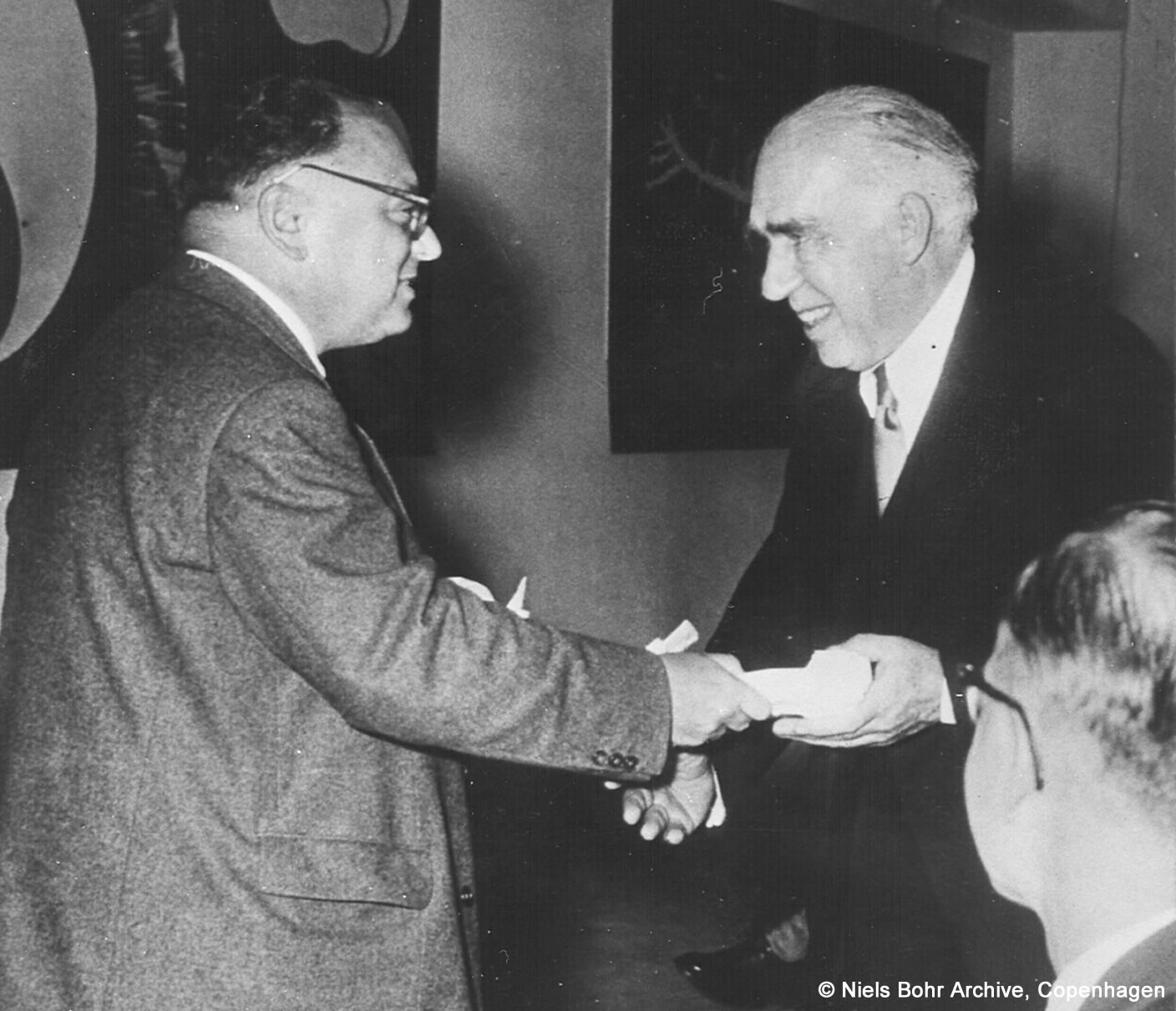 Niels Bohr shakes hands with Wolfgang Pauli