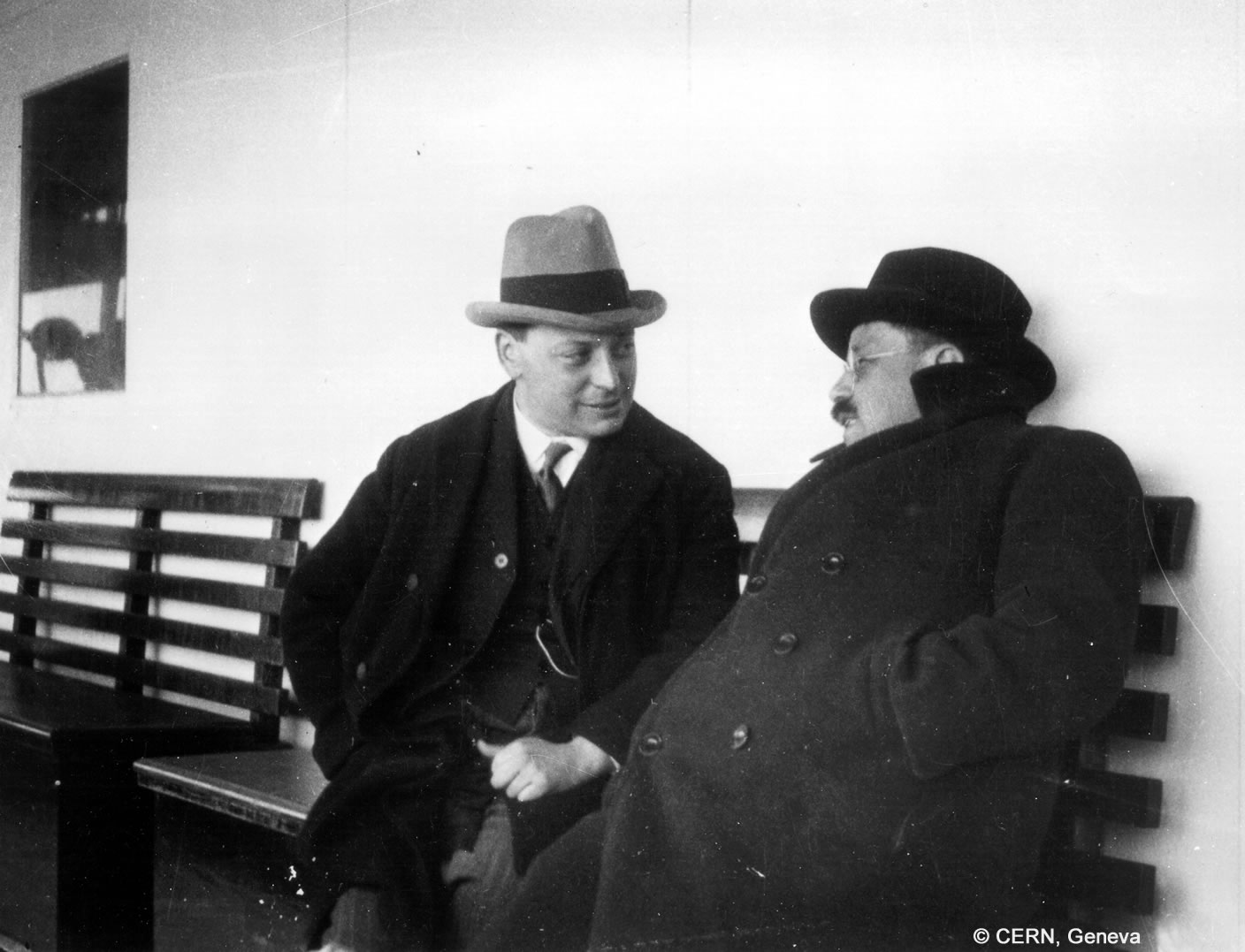 Wolfgang Pauli and Paul Ehrenfest sitting on a bench