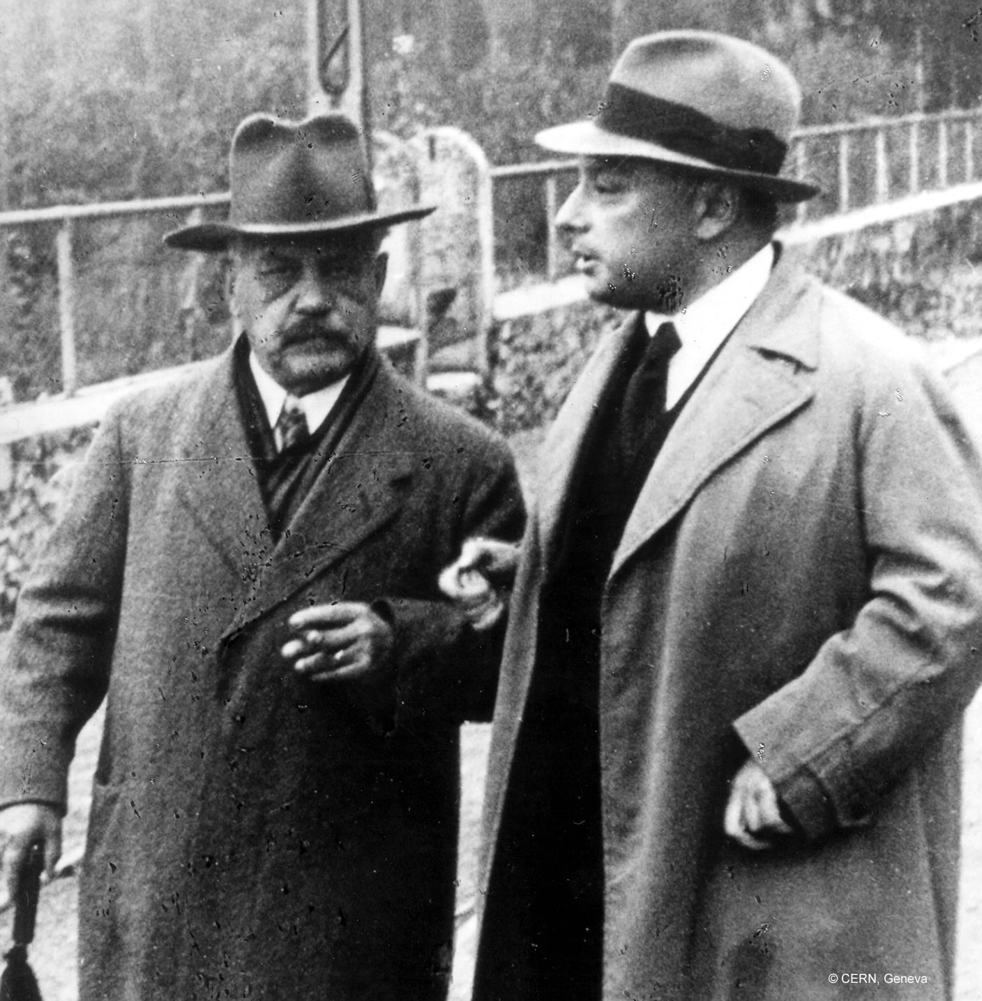 Wolfgang Pauli holds his teacher and mentor Arnold Sommerfeld by the arm.