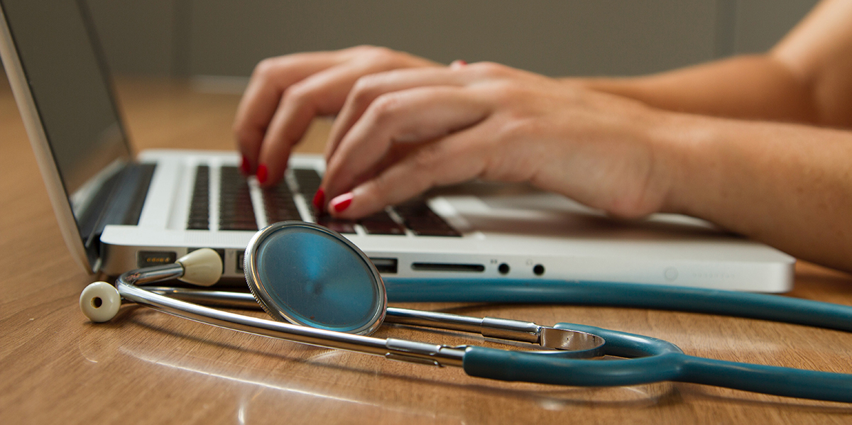 Stethoscope and Laptop Computer